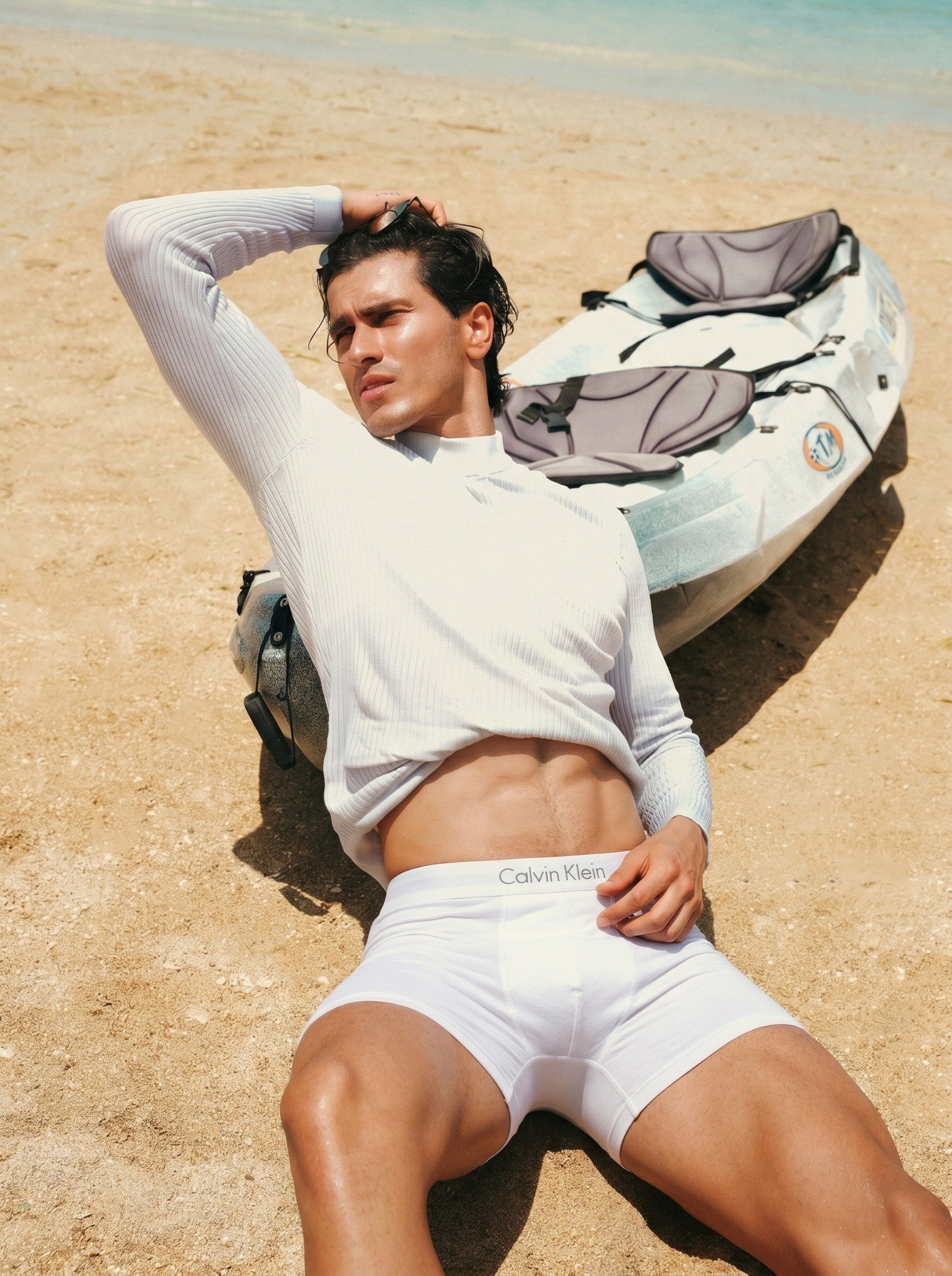 Model wearing white underwear at the beach